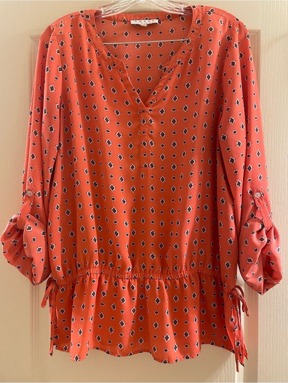 Chaus Coral Diamond-Print Long Sleeve Peplum Top